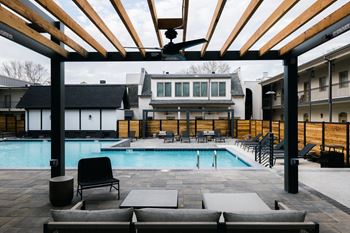 Saltwater pool, spa, and sundeck with cabanas